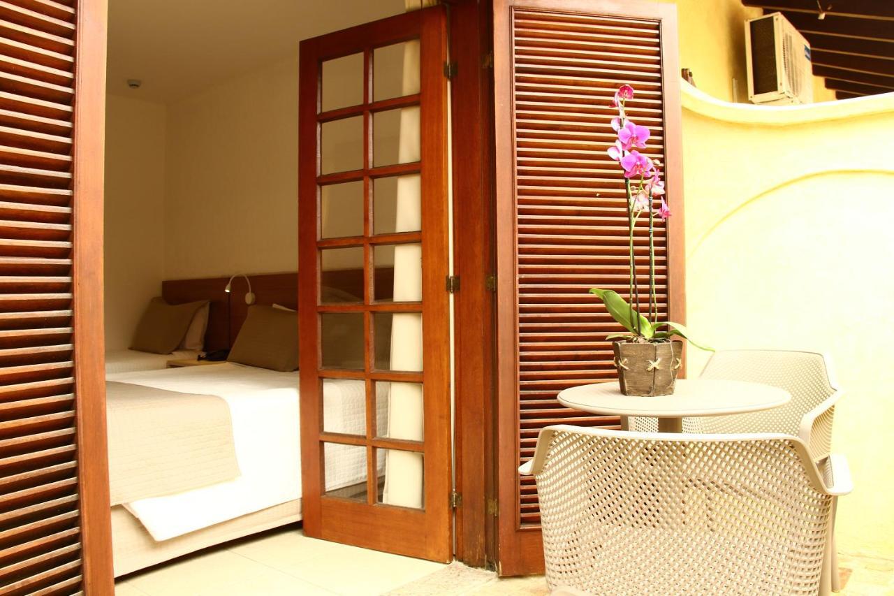 Quarto Duplo com Varanda (2 Adultos + 1 Criança)